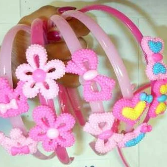 Vincha infantil con apliques